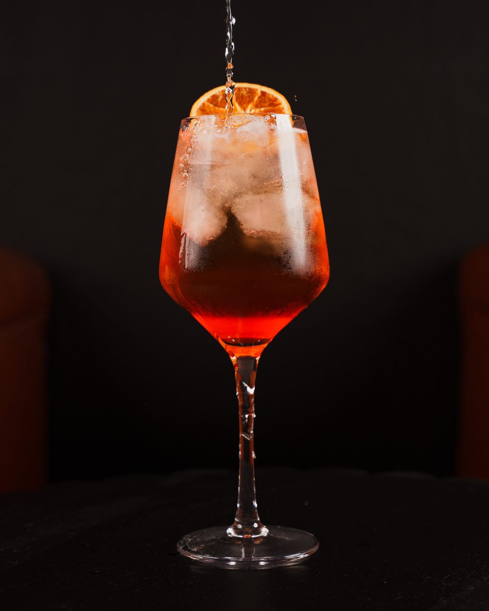 Aperol spritz being poured at Hopsology
